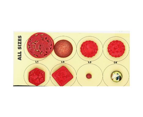 8 S/M/L 20th century mostly Cinnabar buttons. This selection includes a snake, a rooster, several shapes and more. Issued: DI