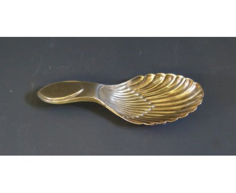 A George V Silver Scallop Shaped Caddy Spoon, Sheffield 1910, Thomas Bradbury &amp; Sons Ltd., 15.3g 