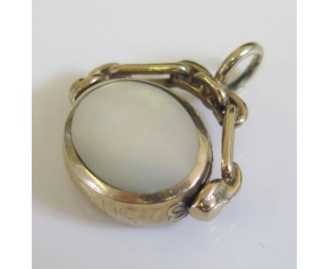 A 9ct Yellow Gold, Onyx and Mother of Pearl Swivel Fob, 22mm wide, 5.6g 