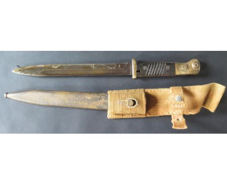 German Mauser Africa Bayonet.  Metal scabbard and canvas Frog 