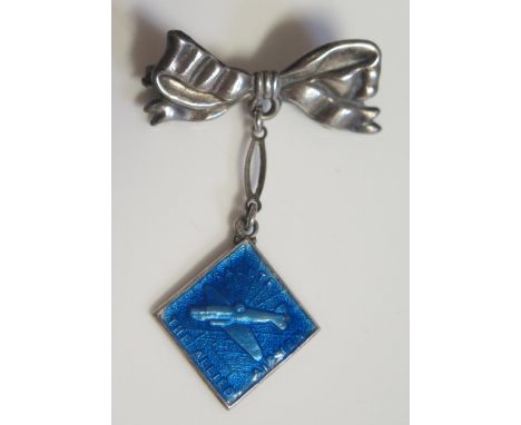 A Silver and Blue Enamel SALUTE THE ALLIED AIRMEN Brooch suspended on ribbon hanger, 50mm drop, 5.4g 