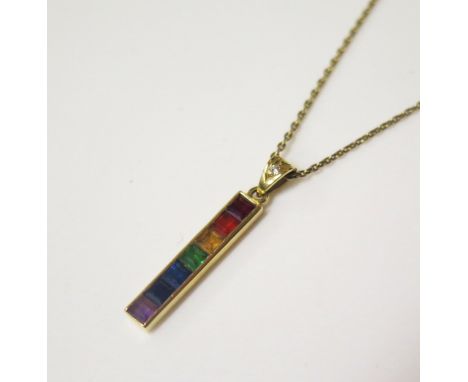 An 18ct Yellow Gold 'Rainbow' Pendant with channel set square cut amethyst, sapphires, demantoid garnet, citrine, fire opal a