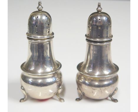 A Pair of George V Silver Pepper Castors, 10cm, Birmingham 1922. maker rubbed, 80g