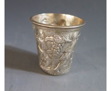 A German .800 Silver Shot with embossed harvest decoration, 42mm high, crescent moon and crown mark and initials S R, 31.3g 