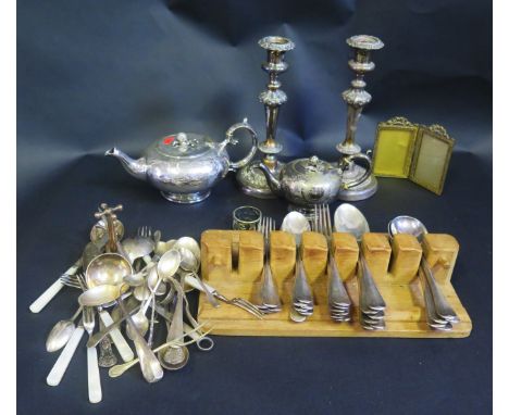 A Selection of Silver Plate including two teapots, pair of 26cm candlesticks and flatware 
