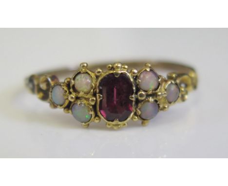 A 19th Century White Opal and Garnet Ring, size S, 1.8g 