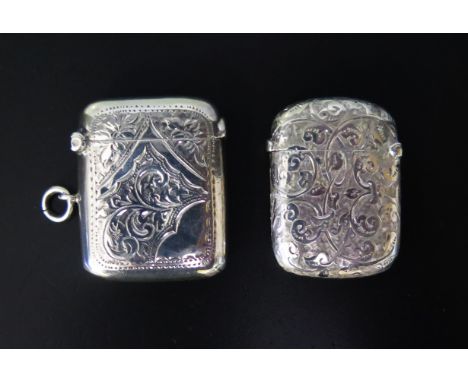 A Victorian Silver Vesta with chased foliate scroll decoration (40x29mm, Birmingham 1886, maker rubbed, 10.8g) and Edward VII