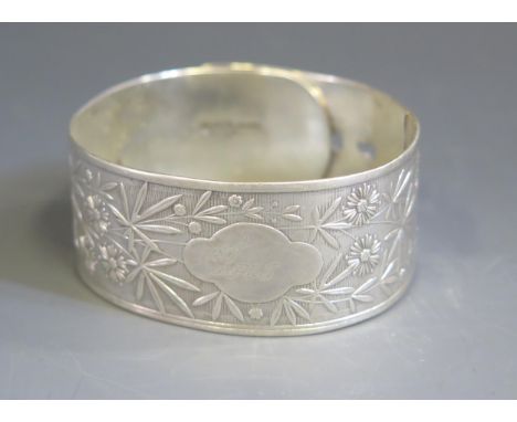 A Silver Adjustable Bangle with foliate decoration, Birmingham 1935, 37g 