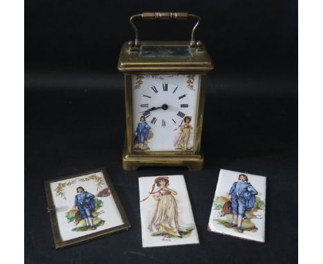 An Antique Brass Carriage Clock with enamel figural panels. A/F