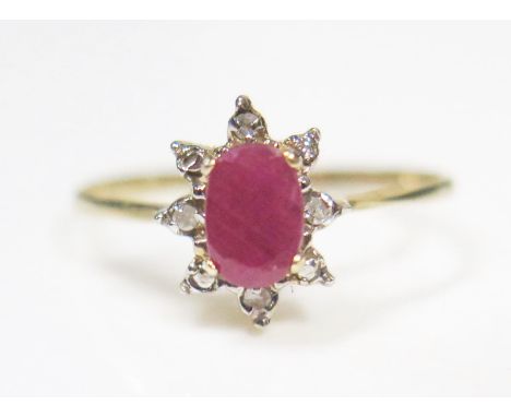 A 9ct Yellow Gold, Ruby and Diamond Ring, size N.5, 1.1g 