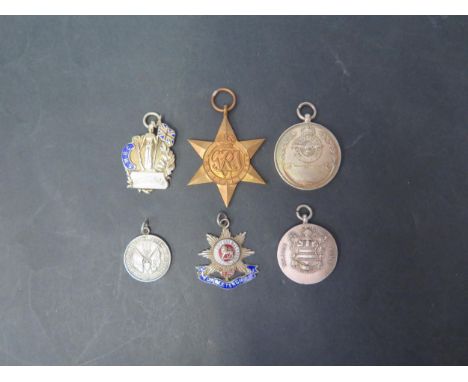 Five Silver Military Fobs including H.A.S. Henlow Tug of War 1926, S.M.R.C. Marksman, Worcestershire, etc. and WWII Italy Sta