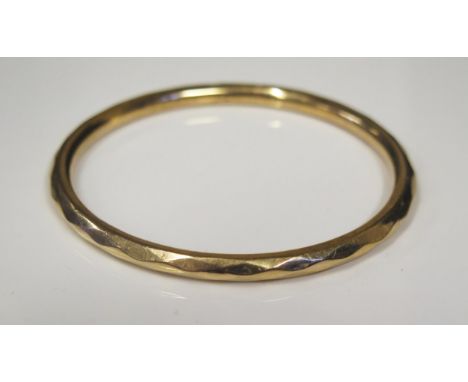 A 15ct Yellow Gold Facetted Bangle, 67mm inside diam., Chester 1923, H.G.&amp;S., 9.5g 