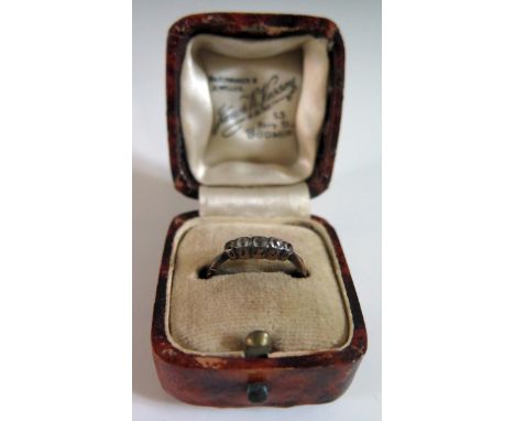 A Boxed Antique 9ct Gold and Diamond Ring, size K.5, 1.8g. A/F 