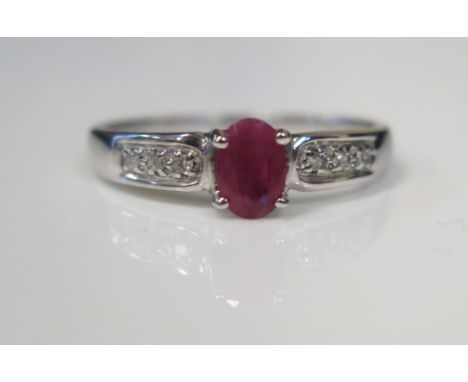 A 9ct White Gold, Ruby and Diamond Dress Ring, size N.5, 1.9g 