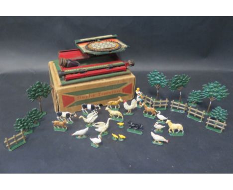 A Small Collection of Painted Lead Farm Animals, woman, trees and fences and A Tinplate Toy Simplex Typewriter Boxed 