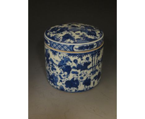 Chinese Blue and White Tea Caddy.  Decorated with multiple figures.  Six character mark on the base.  13cm tall. 