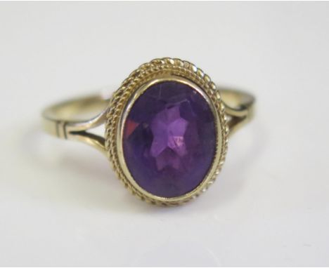 A 9ct Gold and Amethyst Dress Ring, 13x10mm head, size O, 2.7g 