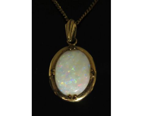 A 9ct Yellow Gold Set White Opal Pendant (17x12mm stone, 2.8g) and on a 16" chain, 2.2g 