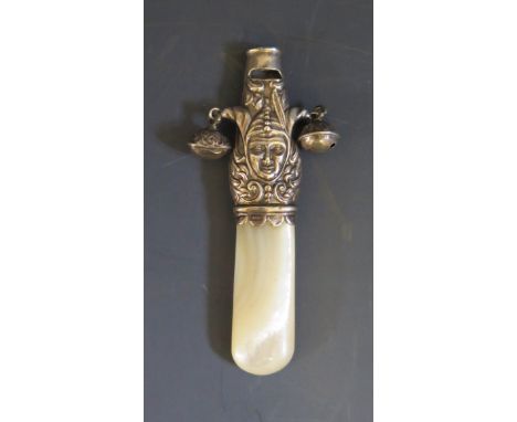 An Edward VII Silver and Mother of Pearl Teething Rattle Whistle decorated with male head, 9.5cm, Birmingham 1903, Hilliard &