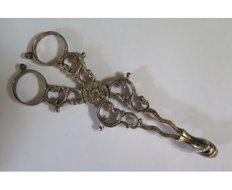 A Pair of Georgian Irish Silver Sugar Tongs, marks rubbed, maker appears to be ?N, 13.5cm, 52g 