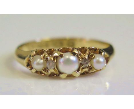 An 18ct Yellow Gold, Pearl and Rose Cut Diamond Five Stone Ring, Birmingham 1943, size G, 1.7g 