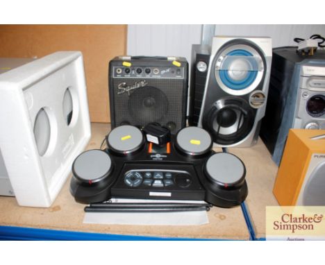 An electronic drum machine and amplifier