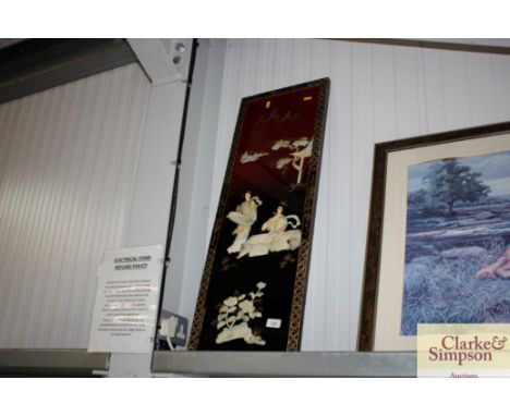 An oriental lacquered panel