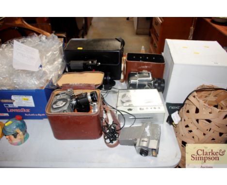 A Yashika zoom lens cine camera; a Vernon cine camera; a Caaiot camera in leather case; a Cosina Magic Sound camera and case;