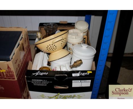 A box containing various kitchenalia, lamp bases etc