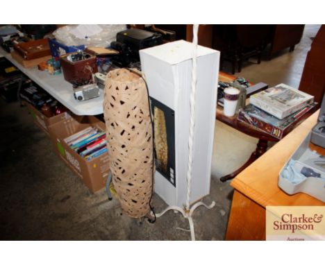 A Next bamboo weave floor lamp; and a metal standard lamp