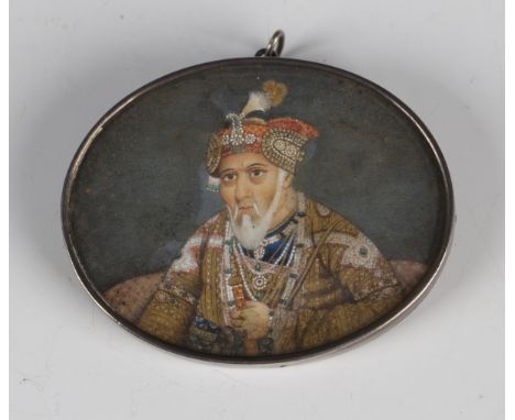 A 19th century Indian watercolour on ivory oval miniature half-length portrait of a Mughal emperor, possibly Bahadur Shah II 