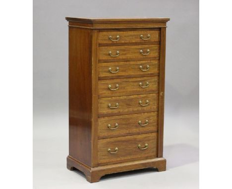 An Edwardian mahogany and satinwood crossbanded Wellington chest by Maple &amp; Co, the top drawer stamped with maker's mark,