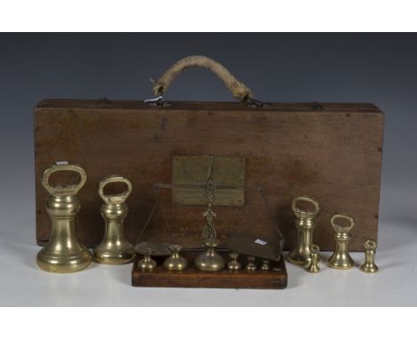 A 19th century set of balance scales by S. Mordan &amp; Co, width 25cm (lacking one weight), a W. &amp; T. Avery Ltd testing 