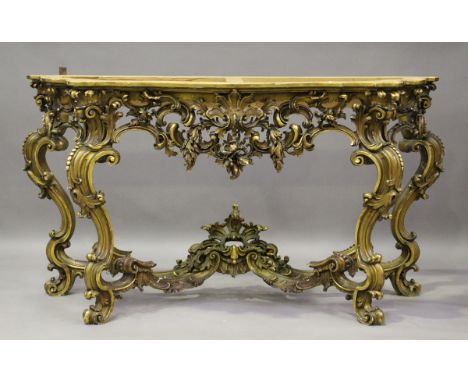 A 20th century Continental Rococo Revival carved giltwood console table, finely modelled with scrolls and foliage, height 91c