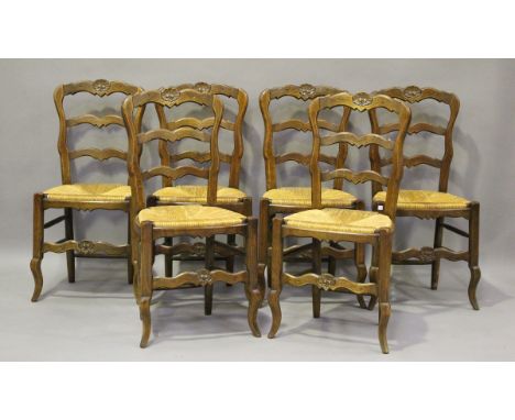 A set of six 20th century French ash framed kitchen chairs with ladder backs and rush seats, height 92cm, width 44cm.Buyer’s 