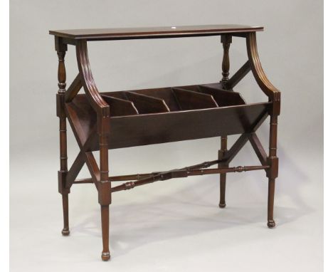 A 20th century reproduction mahogany book trough with ring turned legs and pad feet, height 86cm, width 91cm, depth 38.5cm.Bu
