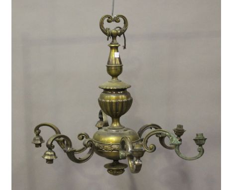 A set of four early/mid-20th century heavy cast brass six-light chandeliers, height 61cm, width 70cm.Buyer’s Premium 29.4% (i