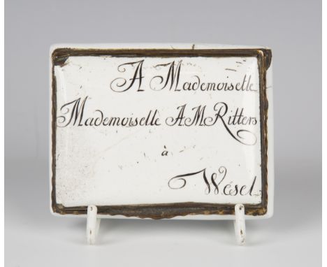 An 18th century white enamel and gilt metal mounted rectangular snuff box, the hinged lid inscribed 'A Mademoiselle A.M. Ritt