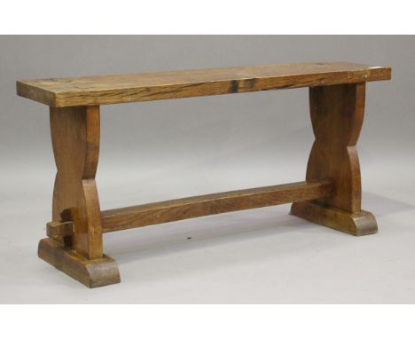 A 20th century provincial oak bench, raised on trestle supports, height 44cm, width 97cm, depth 28cm.Buyer’s Premium 29.4% (i