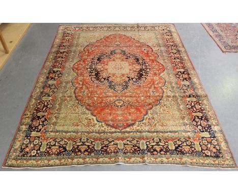 A fine Kurk Kashan carpet, Central Persia, late 19th century, the terracotta field with a lobed flowerhead medallion and ivor