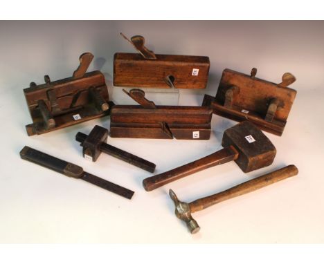 A group of mainly early 20th century carpentry tools, including two sash planes, various moulding planes, saws, mallets, mark