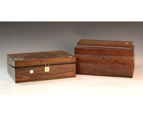 A Victorian figured mahogany tea caddy of cushion form, the hinged lid revealing a fitted interior, height 19cm, width 36cm, 