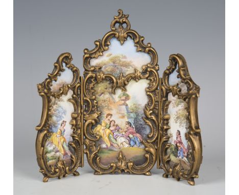 A 20th century gilt metal mounted Viennese enamel diminutive triptych screen, each folding section painted with a Watteau sce