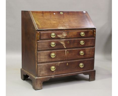 A George III mahogany bureau, the fall flap above four graduated long drawers, on bracket feet, height 108cm, width 104cm, de