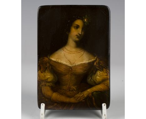 A 19th century papier-mâché rectangular snuff box by Stobwasser, the hinged lid painted with a portrait of a lady, the interi
