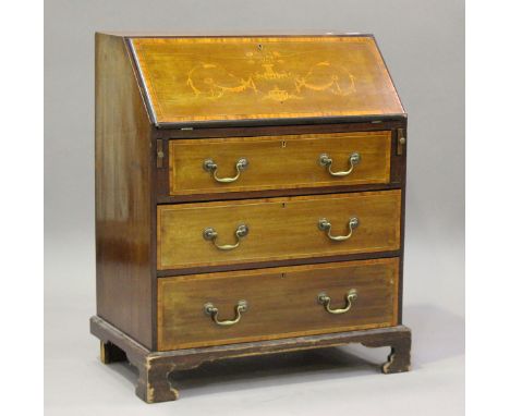 An Edwardian mahogany bureau, the fall flap inlaid with urn and swags above three long drawers, on bracket feet, height 95cm,