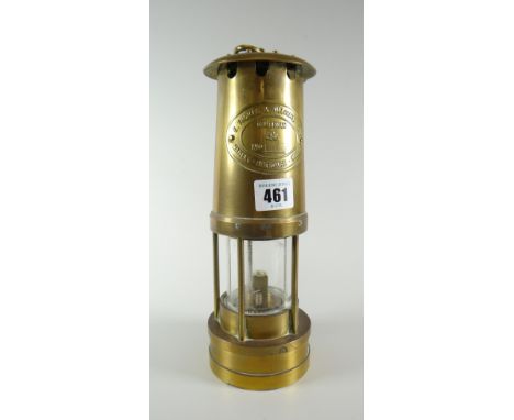 A brass reproduction Thomas &amp; Williams Aberdare miner's lamp Condition reports provided on request by email for this auct