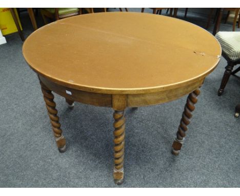 A light oak foldover half moon card table with barley-twist legs Condition reports provided on request by email for this auct