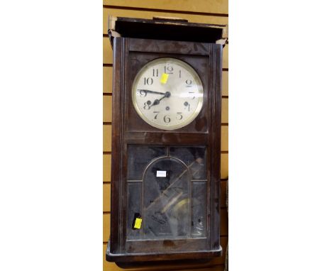 A vintage oak cased wall clock (distressed) Condition reports provided on request by email for this auction otherwise items p