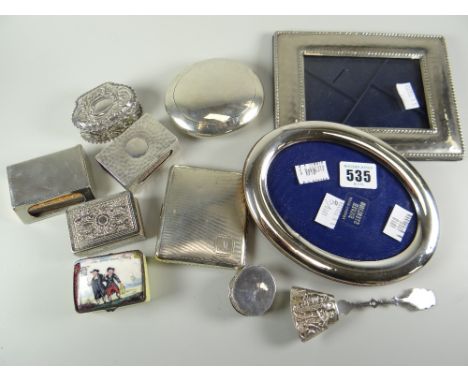 A parcel of small items including silver powder case, two picture fames, silver cigarette-case, silver boxes, two silver matc